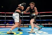 26 November 2016; Katie Taylor, right, exchanges punches with Karina Kopinska during their Super-Featherweight fight at Wembley Arena in London, England. Photo by Stephen McCarthy/Sportsfile