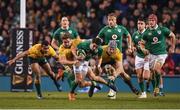 26 November 2016; Joey Carbery of Ireland is tackled by Will Genia, left, David Pocock and Michael Hooper of Australia during the Autumn International match between Ireland and Australia at the Aviva Stadium in Dublin. Photo by Brendan Moran/Sportsfile