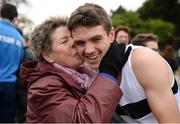27 November 2016; Lewis O'Loughlin of Donore Harriers A.C. receives a kiss on the cheek from his grandmother Marie McDonald after winning the under 16 boys race during the Irish Life Health National Cross Country Championships at the National Sports Campus in Abbotstown, Co Dublin. Photo by Cody Glenn/Sportsfile