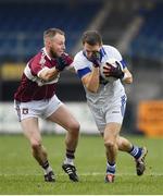 27 November 2016; Tomas Quinn of St. Vincent's is tackled by Conan Brady of St. Columbas during the AIB Leinster GAA Football Senior Club Championship Semi-Final game between St. Columbas and St. Vincent's at Glennon Bros Pearse Park in Longford. Photo by Ramsey Cardy/Sportsfile