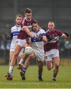 27 November 2016; Gavin Burke of St. Vincent's is tackled by John Keegan of St. Columbas during the AIB Leinster GAA Football Senior Club Championship Semi-Final game between St. Columbas and St. Vincent's at Glennon Bros Pearse Park in Longford. Photo by Ramsey Cardy/Sportsfile