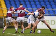 27 November 2016; Tomas Quinn of St. Vincent's is tackled by Patrick Fox, left, Simon Cadam, centre, and David McGivney of St. Columbas during the AIB Leinster GAA Football Senior Club Championship Semi-Final game between St. Columbas and St. Vincent's at Glennon Bros Pearse Park in Longford. Photo by Ramsey Cardy/Sportsfile