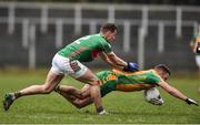 27 November 2016; Michael Lundy of Corofin in action against Niall McInerney of  St Brigid's during the AIB Connacht GAA Football Senior Club Championship Final game between St Brigid's and Corofin at Páirc Seán Mac Diarmada in Carrick-on-Shannon, Co Leitrim. Photo by David Maher/Sportsfile