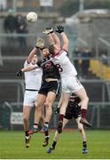 27 November 2016; Meehaul McGrath and Patsy Bradley of Slaughtneil in action against Aaron Morgan of Kilcoo during the AIB Ulster GAA Football Senior Club Championship Final game between Slaughtneil and Kilcoo at the Athletic Grounds in Armagh. Photo by Oliver McVeigh/Sportsfile