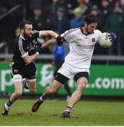 27 November 2016; Christopher McKaigue of Slaughtneil in action against Conor Laverty of Kilcoo during the AIB Ulster GAA Football Senior Club Championship Final game between Slaughtneil and Kilcoo at the Athletic Grounds in Armagh. Photo by Philip Fitzpatrick/Sportsfile