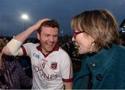 27 November 2016; Paul Bradley of Slaughtneil celebrates with a supporter after the AIB Ulster GAA Football Senior Club Championship Final game between Slaughtneil and Kilcoo at the Athletic Grounds in Armagh. Photo by Oliver McVeigh/Sportsfile