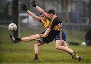 27 November 2016; Kieran O'Leary of Dr Crokes scores a point despite the efforts of Jamie Barron of The Nire during the AIB Munster GAA Football Senior Club Championship Final between Dr. Crokes and The Nire at Mallow GAA Complex in Mallow, Co Cork. Photo by Diarmuid Greene/Sportsfile