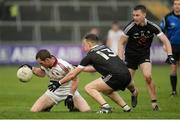 27 November 2016; Patsy Bradley of Slaughtneil in action against Martin Devlin and Paul Devlin of Kilcoo during the AIB Ulster GAA Football Senior Club Championship Final game between Slaughtneil and Kilcoo at the Athletic Grounds in Armagh. Photo by Oliver McVeigh/Sportsfile