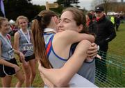27 November 2016; Sophie Murphy, who won the Junior Women's event, from Dundrum South Dublin A.C., hugs team-mate Josie McCann during the Irish Life Health National Cross Country Championships at the National Sports Campus in Abbotstown, Co Dublin.  Photo by Cody Glenn/Sportsfile