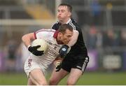 27 November 2016; Patsy Bradley of Slaughtneil in action against Paul Devlin of Kilcoo during the AIB Ulster GAA Football Senior Club Championship Final game between Slaughtneil and Kilcoo at the Athletic Grounds in Armagh. Photo by Oliver McVeigh/Sportsfile