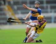 17 April 2011; Eoin Quigley, Wexford, in action against Michael Heffernan, Tipperary. Allianz Hurling League, Division 1, Round 7, Tipperary v Wexford, Semple Stadium, Thurles, Co. Tipperary. Picture credit: Brian Lawless / SPORTSFILE