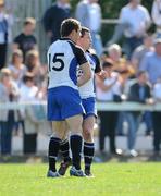 17 April 2011; Cork Constitution's Sean Scanlon congratulates team-mate Gerry Hurley at the final whistle. Ulster Bank League, Division 1, Semi-Final, Cork Constitution v Young Munster, Temple Hill, Cork. Picture credit: Ken Sutton / SPORTSFILE