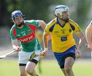 17 April 2011; Kevin Conneely, Roscommon, in action against Stephen Broderick, Mayo. Allianz GAA Hurling Division 3B Final, Mayo v Roscommon, Carrick-on-Shannon, Leitrim. Picture credit: Ray Ryan / SPORTSFILE