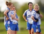 17 April 2011; Dejected Monaghan players, from left, Nicola Fahy, Aoife McAnespie, Therese McNally and Ciara McAnespie, after the game. Bord Gais Energy National Football League, Division One, Semi-Final, Monaghan v Laois, Ballymahon, Longford. Photo by Sportsfile