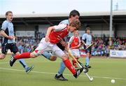 17 April 2011; Timothy Smyth, Cookstown, is shouldered from the ball by Richard Sykes, Monkstown. ESB Electric Ireland Men's Irish Senior Cup Final, Cookstown v Monkstown, National Hockey Stadium, UCD, Belfield, Dublin. Picture credit: Barry Cregg / SPORTSFILE