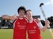 17 April 2011; Cookstown team-mates Mark Crooks, left, and Andrew Barbour celebrate victory after the game. ESB Electric Ireland Men's Irish Senior Cup Final, Cookstown v Monkstown, National Hockey Stadium, UCD, Belfield, Dublin. Picture credit: Barry Cregg / SPORTSFILE