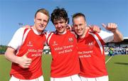 17 April 2011; Cookstown team-mates Paul Thompson, left, Mark Crooks, centre, and Richard Nelson celebrate victory after the game. ESB Electric Ireland Men's Irish Senior Cup Final, Cookstown v Monkstown, National Hockey Stadium, UCD, Belfield, Dublin. Picture credit: Barry Cregg / SPORTSFILE