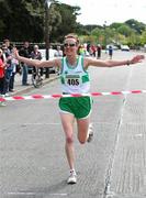 17 April 2011; Orla Gormley, Raheny Shamrocks A.C, crosses the line to win the Master Womens Road Relay. Woodie’s DIY Road Relay Championships of Ireland. Raheny, Dublin. Picture credit: Tomas Greally / SPORTSFILE