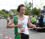 17 April 2011; Úna Britton, Kilcoole A.C, crosses the line to win the Senior Womens Road Relay. Woodie’s DIY Road Relay Championships of Ireland. Raheny, Dublin. Picture credit: Tomas Greally / SPORTSFILE
