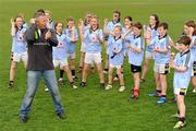 18 April 2011; All Black legend and Laureus Sport for Good Foundation goodwill ambassador Sean Fitzpatrick teaches members of the Kilmacud Crokes U12 Boys and Girls teams how to do 'The Haka'. Kilmacud Crokes GAA Club, Stillorgan, Co. Dublin. Picture credit: Barry Cregg / SPORTSFILE