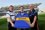 19 April 2011; Pictured at the announcement of Skoda as the new sponsor for Tipperary GAA and the unveiling of the new Tipperary GAA strip for 2011 is Ray Leddy, Marketing Manager of Skoda Ireland, centre, with Tipperary hurling manager Declan Ryan, left, and Tipperary football manager John Evans. The three year sponsorship agreement which begins following the 2011 National Leagues will see Skoda Ireland invest approx €200,000 per annum into the Premier County. The full sponsorship of Tipperary GAA covers both the hurling and football codes and includes all grades from minor to senior inter-county teams. As part of the sponsorship agreement, the new look Tipperary jersey was unveiled displaying the Skoda brand name. Croke Park, Dublin. Picture credit: Brian Lawless / SPORTSFILE