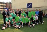19 April 2011; Cllr. Gerry Breen, Lord Mayor of Dublin, and UEFA President Michel Platini with FAI President, Paddy McCaul, John Delaney, FAI CEO, Ronnie Whelan, UEL Final Ambassador, his former Republic of Ireland team-mate Ray Houghton, Anto Reilly, Hardwicke F.C. players and officials after Mr. Platini visited the club's facilities and the Football for All Programme while in Dublin for the UEFA Europa League Trophy Handover in advance of the UEFA Europa League final, to be played at the Aviva Stadium on Wednesday 18 May. Hardwicke Street, Dublin. Picture credit: Ray McManus / SPORTSFILE