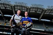19 April 2011; Pictured at the announcement of Skoda as the new sponsor for Tipperary GAA and the unveiling of the new Tipperary GAA strip for 2011 are Tipperary hurlers Brendan Cummins, left, and Eoin Kelly. The three year sponsorship agreement which begins following the 2011 National Leagues will see Skoda Ireland invest approx €200,000 per annum into the Premier County. The full sponsorship of Tipperary GAA covers both the hurling and football codes and includes all grades from minor to senior inter-county teams. As part of the sponsorship agreement, the new look Tipperary jersey was unveiled displaying the Skoda brand name. Croke Park, Dublin. Picture credit: Brian Lawless / SPORTSFILE