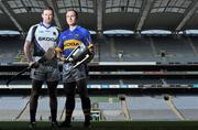 19 April 2011; Pictured at the announcement of Skoda as the new sponsor for Tipperary GAA and the unveiling of the new Tipperary GAA strip for 2011 are Tipperary hurlers Brendan Cummins, left, and Eoin Kelly. The three year sponsorship agreement which begins following the 2011 National Leagues will see Skoda Ireland invest approx €200,000 per annum into the Premier County. The full sponsorship of Tipperary GAA covers both the hurling and football codes and includes all grades from minor to senior inter-county teams. As part of the sponsorship agreement, the new look Tipperary jersey was unveiled displaying the Skoda brand name. Croke Park, Dublin. Picture credit: Brian Lawless / SPORTSFILE