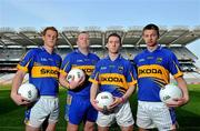 19 April 2011; Pictured at the announcement of Skoda as the new sponsor for Tipperary GAA and the unveiling of the new Tipperary GAA strip for 2011 are Tipperary footballers, from left, George Hannigan, Paul Fitzgerald, Brian Mulvihill, and Hugh Coghlan. The three year sponsorship agreement which begins following the 2011 National Leagues will see Skoda Ireland invest approx €200,000 per annum into the Premier County. The full sponsorship of Tipperary GAA covers both the hurling and football codes and includes all grades from minor to senior inter-county teams. As part of the sponsorship agreement, the new look Tipperary jersey was unveiled displaying the Skoda brand name. Croke Park, Dublin. Picture credit: Brian Lawless / SPORTSFILE