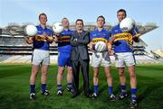 19 April 2011; Pictured at the announcement of Skoda as the new sponsor for Tipperary GAA and the unveiling of the new Tipperary GAA strip for 2011 is Ray Leddy, Marketing Manager of Skoda Ireland, with Tipperary footballers, from left, George Hannigan, Paul Fitzgerald, Brian Mulvihill, and Hugh Coghlan. The three year sponsorship agreement which begins following the 2011 National Leagues will see Skoda Ireland invest approx €200,000 per annum into the Premier County. The full sponsorship of Tipperary GAA covers both the hurling and football codes and includes all grades from minor to senior inter-county teams. As part of the sponsorship agreement, the new look Tipperary jersey was unveiled displaying the Skoda brand name. Croke Park, Dublin. Picture credit: Brian Lawless / SPORTSFILE