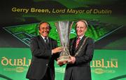 19 April 2011; UEFA President Michel Platini hands over the UEFA Europa League Trophy to Cllr. Gerry Breen, Lord Mayor of Dublin, for the city to keep and display to the public until the UEFA Europa League final, to be played at the Aviva Stadium on Wednesday 18 May. Royal Hospital Kilmainham, Dublin. Picture credit: David Maher / SPORTSFILE