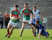 10 April 2011; Jason Doherty, Mayo, goes past Monaghan goalkeeper Mark Keogh to score his side's second goal. Allianz Football League, Division 1, Round 7, Monaghan v Mayo, Inniskeen, Co. Monaghan. Picture credit: Brian Lawless / SPORTSFILE
