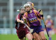 17 April 2011; Kate Kelly, Wexford, in action against Emer Haverty, Galway. Irish Daily Star Camogie League, Division 1, Final, Galway v Wexford, Semple Stadium, Thurles, Co. Tipperary. Picture credit: Brian Lawless / SPORTSFILE