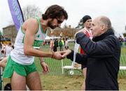 27 November 2016; Irish Life Health Managing Director Jim Dowdall presents Mick Clohisey of Raheny Shamrock A.C. with his second place medal following the Senior Men's race during the Irish Life Health National Cross Country Championships at the National Sports Campus in Abbotstown, Co Dublin. Photo by Cody Glenn/Sportsfile