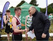 27 November 2016; Irish Life Health Managing Director Jim Dowdall presents Jack O'Leary, Mullingar Harriers, with his first place medal following the following the Junior Men's race during the Irish Life Health National Cross Country Championships at the National Sports Campus in Abbotstown, Co Dublin. Photo by Cody Glenn/Sportsfile