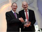 30 November 2016; Brian Lynch, right, is presented with the Master Athlete of the Year award by Mick Fennell, President of the Master Athletics Association, at the Irish Life Health National Athletics Awards 2016 at the Crowne Plaza Hotel in Santry, Dublin. Photo by Seb Daly/Sportsfile