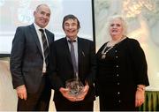30 November 2016; Liam Fleming is presented with the Inspirational Performace on Irish Soil award, on behalf of winner Phil Healy, by Jim Dowdall, Managing Director at Irish Life Health, left, and Georgina Drumm, President of Athletics Ireland, right, at the Irish Life Health National Athletics Awards 2016 at the Crowne Plaza Hotel in Santry, Dublin. Photo by Seb Daly/Sportsfile
