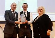 30 November 2016; Thomas Barr is presented with the Track and Field Athlete of the Year award by Jim Dowdall, Managing Director at Irish Life Health, left, and Georgina Drumm, President of Athletics Ireland, right, at the Irish Life Health National Athletics Awards 2016 at the Crowne Plaza Hotel in Santry, Dublin. Photo by Seb Daly/Sportsfile