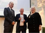 30 November 2016; Ray Flynn, centre, is presented the Endurance Athlete of the Year award, on behalf of winner Rob Heffernan, by Jim Dowdall, Managing Director at Irish Life Health, left, and Georgina Drumm, President of Athletics Ireland, right, at the Irish Life Health National Athletics Awards 2016 at the Crowne Plaza Hotel in Santry, Dublin. Photo by Seb Daly/Sportsfile