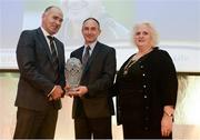30 November 2016; Marcus O'Sullivan, centre, is presented with the Hall of Fame award by Jim Dowdall, Managing Director at Irish Life Health, left, and Georgina Drumm, President of Athletics Ireland, right, at the Irish Life Health National Athletics Awards 2016 at the Crowne Plaza Hotel in Santry, Dublin. Photo by Seb Daly/Sportsfile