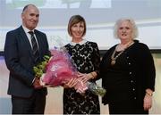 30 November 2016; Olive Loughnane, centre, is joined by Jim Dowdall, Managing Director at Irish Life Health, left, and Georgina Drumm, President of Athletics Ireland, right, after having her 2009 World Championships 20km Race Walk silver medal upgraded to gold at the Irish Life Health National Athletics Awards 2016 at the Crowne Plaza Hotel in Santry, Dublin. Photo by Seb Daly/Sportsfile