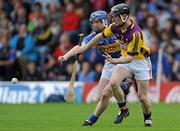 17 April 2011; Jim Berry, Wexford, in action against Eddie Connolly, Tipperary. Allianz Hurling League, Division 1, Round 7, Tipperary v Wexford, Semple Stadium, Thurles, Co. Tipperary. Picture credit: Brian Lawless / SPORTSFILE