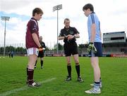 16 April 2011; Referee Fergal Kelly asks Dublin captain which end he wants his team to shoot towards after winning the coin toss over Westmeath Captain Paddy Holloway, left. Leinster GAA Football Minor Championship, First Round, Dublin v Westmeath, Parnell Park, Dublin. Picture credit: Barry Cregg / SPORTSFILE