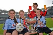 20 April 2011; Pictured at the Allianz Football Division 1 & 2 Finals Preview are Cumann na mBunscoil players, from left to right, Amy Cummins, Niamh Cummins, Ciaran Brennan and Patrick Bridgeman, all from Holy Trinity National School, Donaghmeade, Co. Dublin. Croke Park, Dublin. Picture credit: David Maher / SPORTSFILE