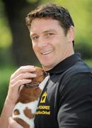 20 April 2011; Pictured at the launch of the 2011 Pedigree Adoption Drive is dog lover, Munster and Ireland rugby star David Wallace, with his friend Tia, a Jack Russell pup, from the ISPCA. 45 dogs are abandoned in Ireland every day, 17 dogs are put to sleep. In order to help curb these startling figures, Pedigree has teamed up David and Aoibhinn for the 2011 Annual Pedigree Adoption Drive. St. Stephen's Green, Dublin. Picture credit: Brian Lawless / SPORTSFILE