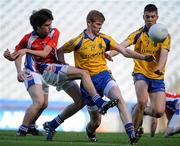23 April 2011; Brian Twomey, New York, has his attempt on goal blocked by Maurice Connaughton, centre, and Conor Daly, Roscommon. Connacht GAA Football Minor Championship, Preliminary Round, New York v Roscommon, Croke Park, Dublin. Picture credit: Barry Cregg / SPORTSFILE