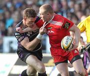 23 April 2011; Paul Warwick, Munster, is tackled by Nikki Walker, Ospreys. Celtic League, Ospreys v Munster, Liberty Stadium, Swansea, Wales. Picture credit: Steve Pope / SPORTSFILE