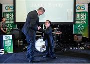 2 December 2016; James Scully, right, from Glasnevin, Dublin, living in Ratoath, Meath, accepts his prize for Outstanding Team Member (Athlete), from Dave Malone, Irish Paralympic Performance Director, at the OCS Irish Paralympic Awards at the Ballsbridge Hotel in Dublin. Photo by Cody Glenn/Sportsfile