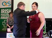 2 December 2016; Orla Barry, from Ladysbridge, Co Cork, is awarded her silver medal for discus after being upgraded from bronze during the 2015 IPC World Championships in Doha by 2016 Chef de Mission Denis Toomey at the OCS Irish Paralympic Awards at the Ballsbridge Hotel in Dublin. Photo by Cody Glenn/Sportsfile