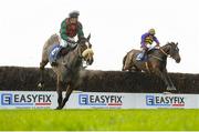 3 December 2016; Not For Burning, with Robbie Power up, clears the last ahead of Emcon, with Jonathan Burke up, on their way to winning the Irish Stallion Farms European Breeders Fund Mares Handicap Steeplechase during the Fairyhouse Winter Festival at Fairyhouse, Co. Meath. Photo by Cody Glenn/Sportsfile